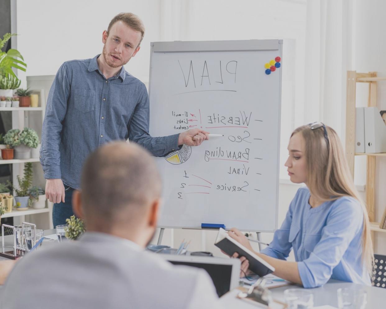 Business professional reviewing financial charts and budget allocations