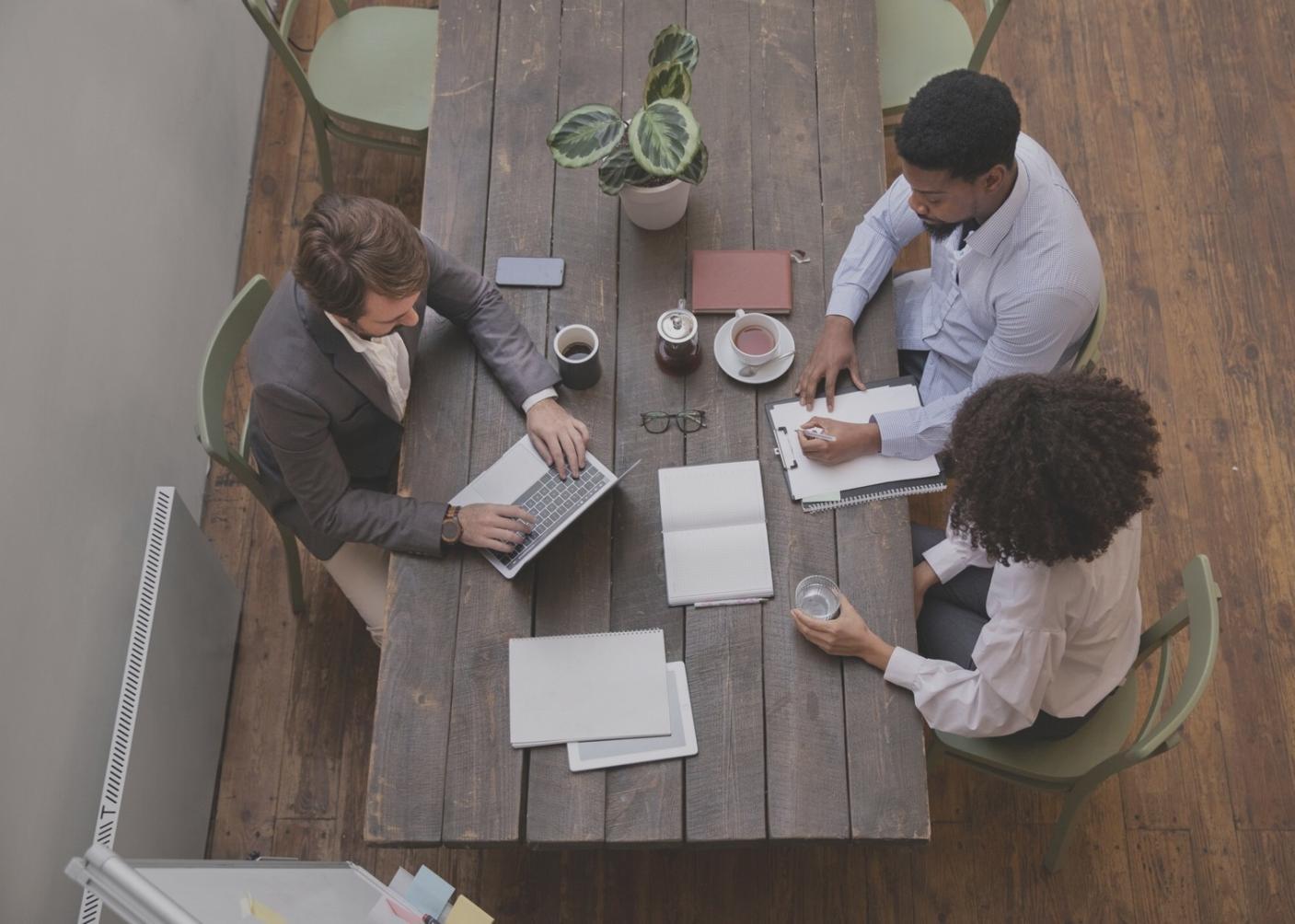 Students learning budget allocation methods in classroom setting